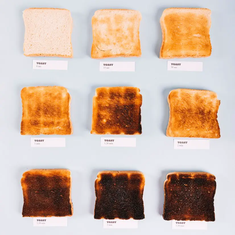 top view bread slices varying stages toasting white background 23 2147926620