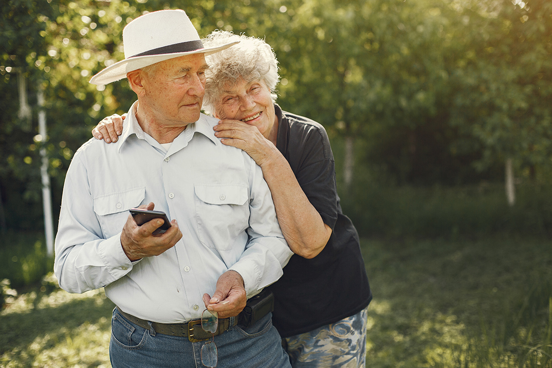 beautiful old couple spend time summer garden