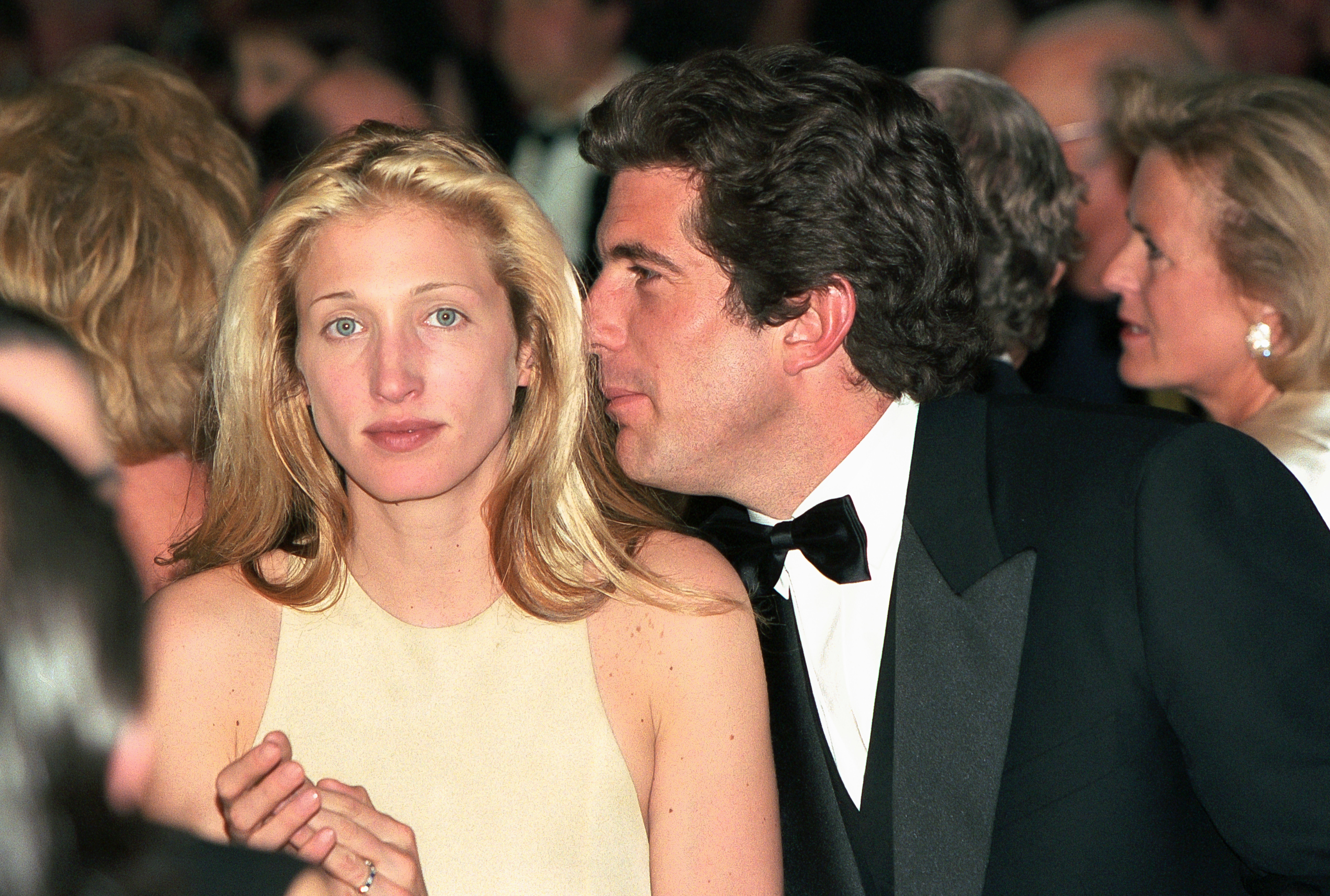 Carolyn Bessette-Kennedy and John F. Kennedy Jr. during a reception at Chateau de Malagny, circa 1996. | Source: Getty Images