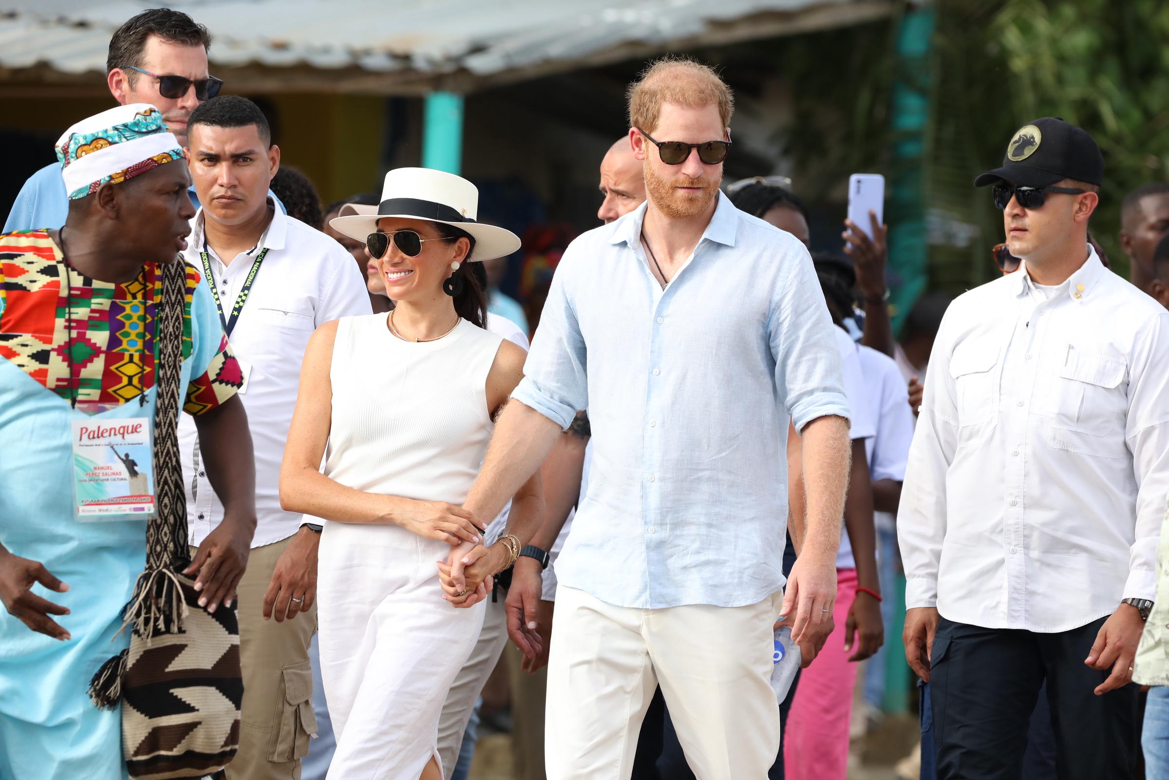 Meghan Markle and Prince Harry in the streets of San Basilio de Palenque during their Colombia tour on August 17, 2024. | Source: Getty Images