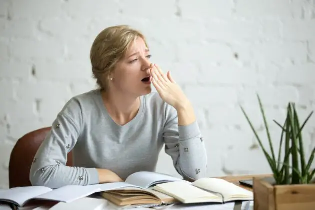 portrait yawning student girl desk 1163 2569 630x420 1